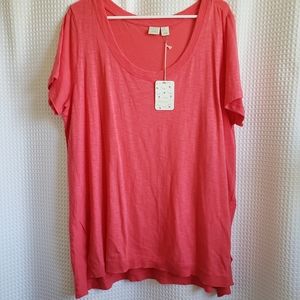 Lightweight cotton blend top with split hem.